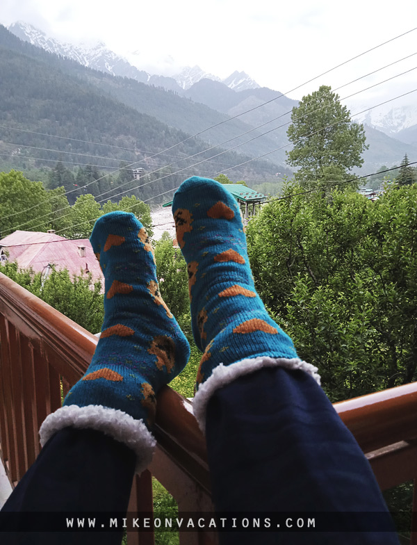 My child wearing warm socks in the Himalayas cold mountain weather