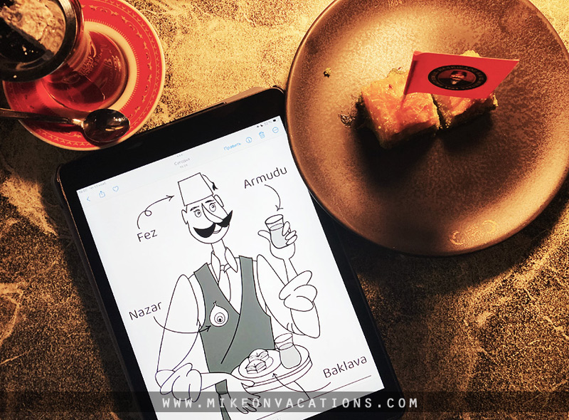 Sipping Turkish tea in a traditional tulip-shaped glass Turkish tea and baklava in a cafe, creative moments in Istanbul with kids