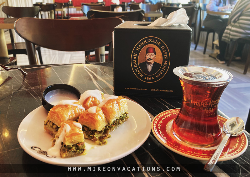 Tasting authentic Turkish baklava in Istanbul Traditional Turkish baklava and tea, food experiences in Istanbul with kids