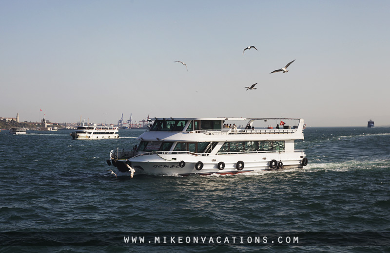 Feeding seagulls from a Bosphorus ferry in Istanbul Ferries on the Bosphorus with seagulls flying above, Istanbul with kids