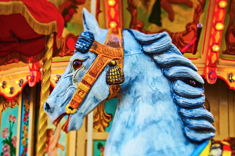 Fun rides for kids at Bostancı Luna Park Riding a carousel horse at Bostancı Luna Park