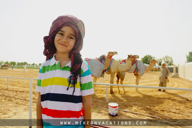 Mike with camels desert Dubai family travel experience