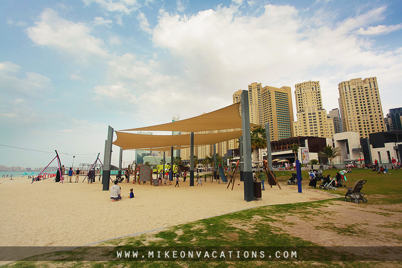 Dubai Marina beach skyline with playground family friendly area Dubai