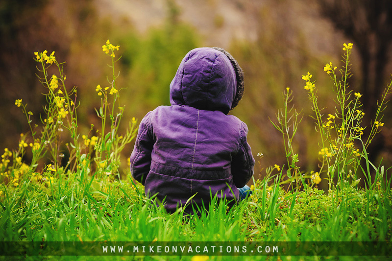 Child looking at Himalayan mountains Manali family hiking