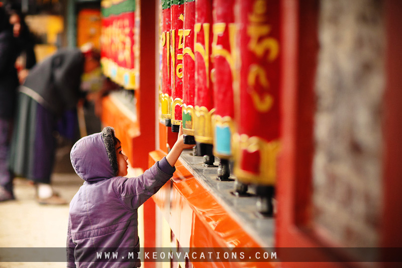 Mike spinning prayer wheels Buddhist temple Himalayas Manali