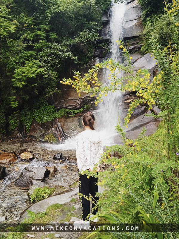 Child looking at waterfall Himalayas Manali Jogini Rahala hike