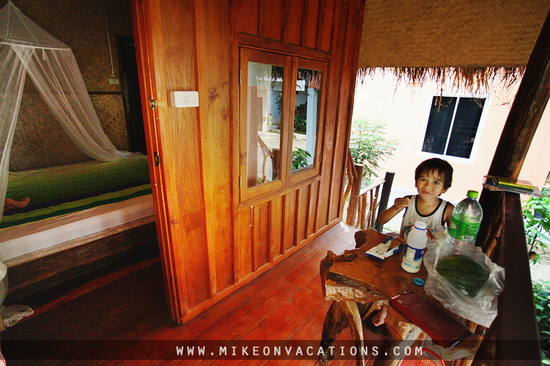 Toddler having breakfast with fruit and snacks in Pattaya Thailand