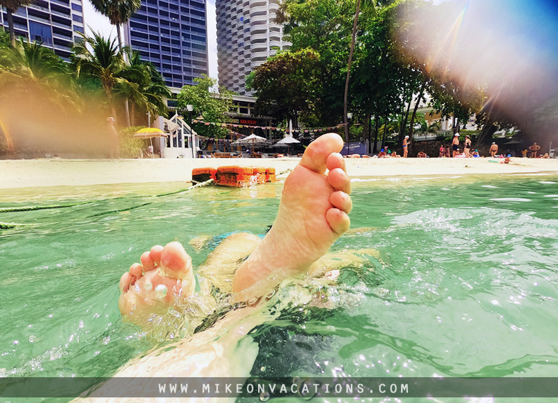 Swimming with kids at Wongamat Beach Child swimming at Wongamat Beach in Pattaya