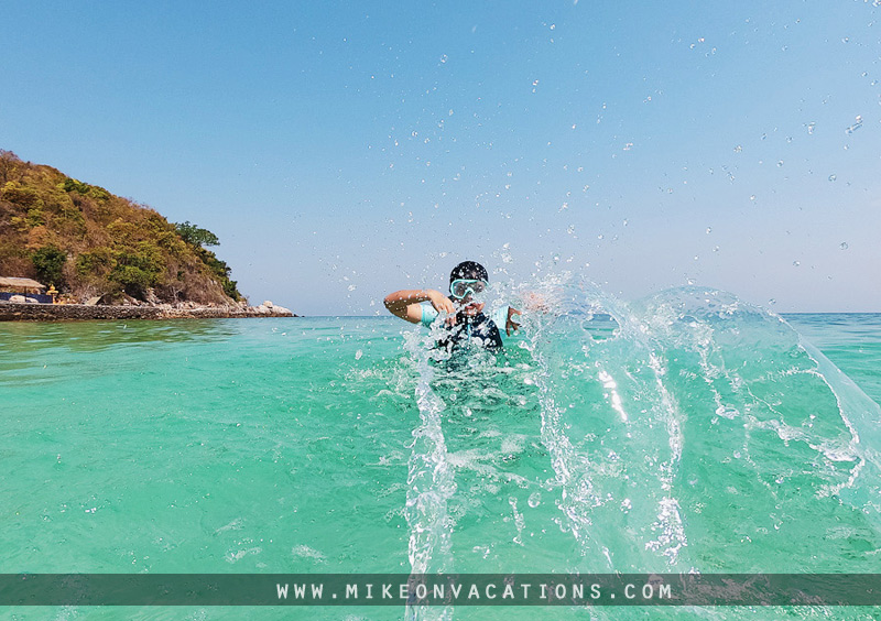 Snorkeling with kids on Koh Larn Child snorkeling at Sangwan Beach Koh Larn