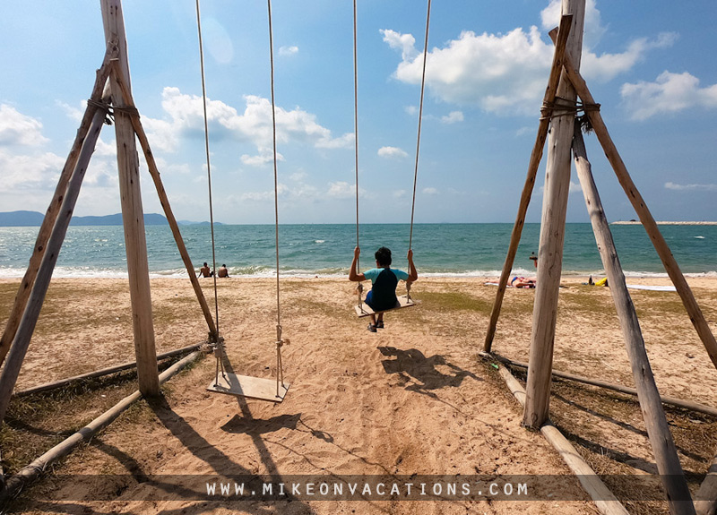 Ban Amphur Beach for families Child on seaside swing at Ban Amphur Beach